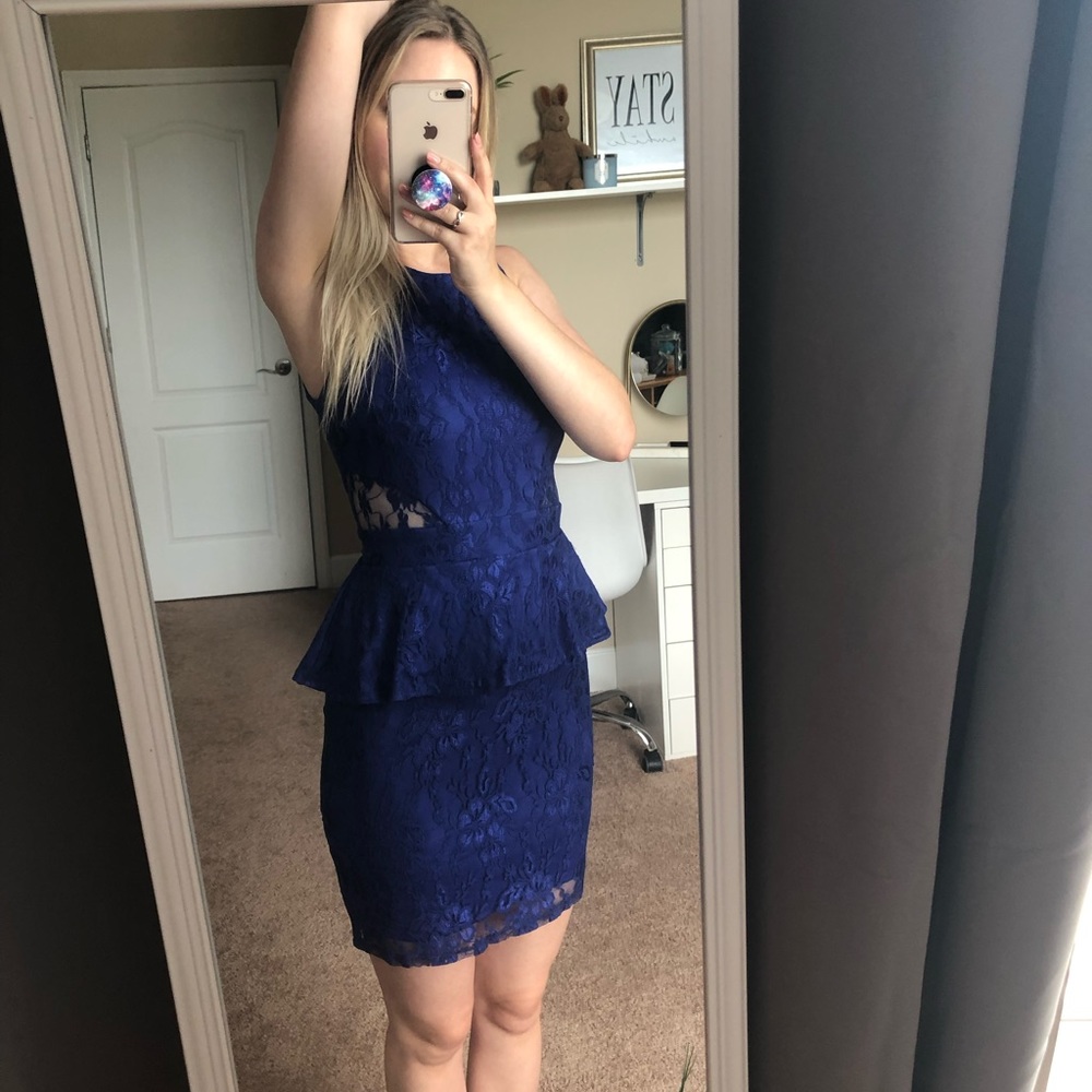 Cobalt blue peplum bodycon dress with cutouts